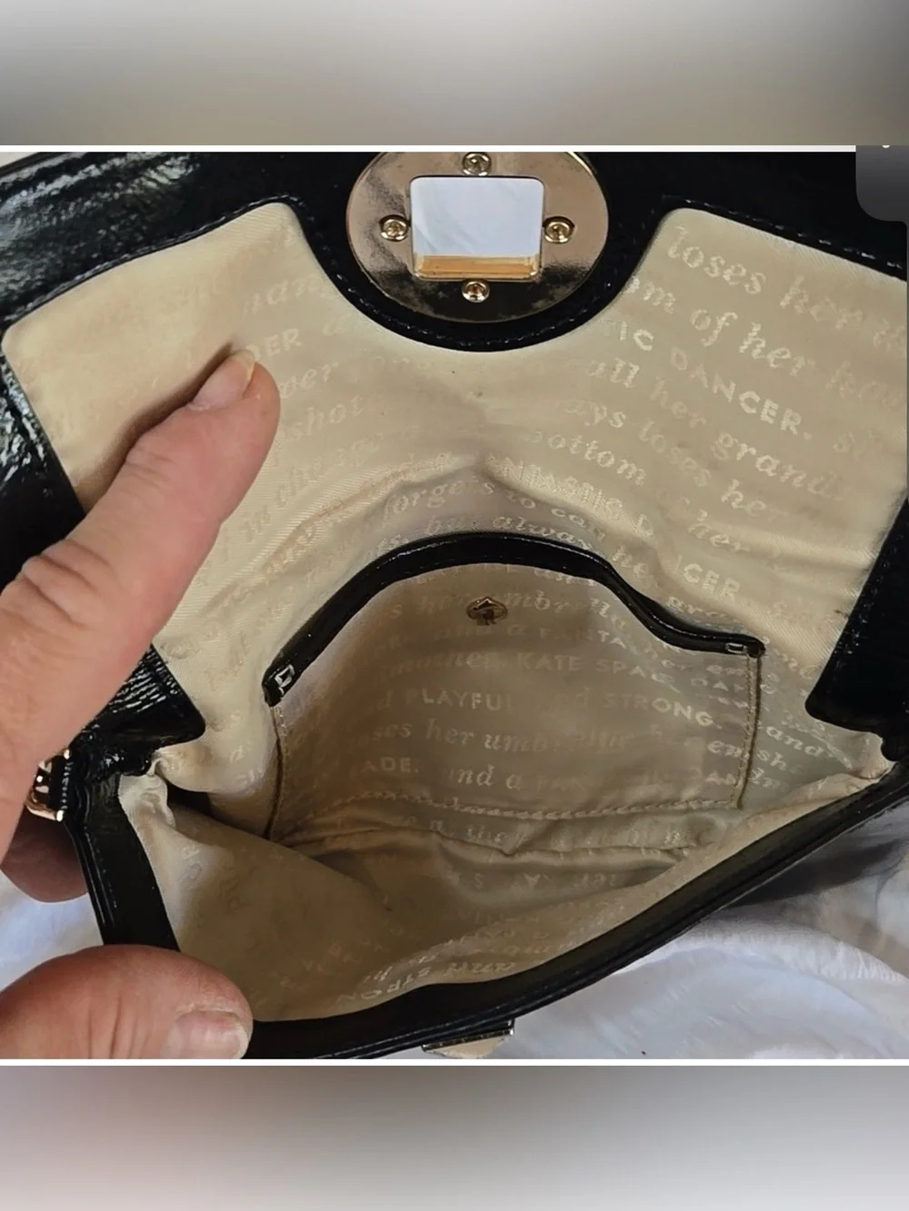 Kate Spade Fanfare Missy wristlet with storybook lining EUC